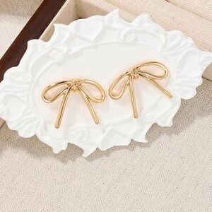 Gold Bow stud earrings